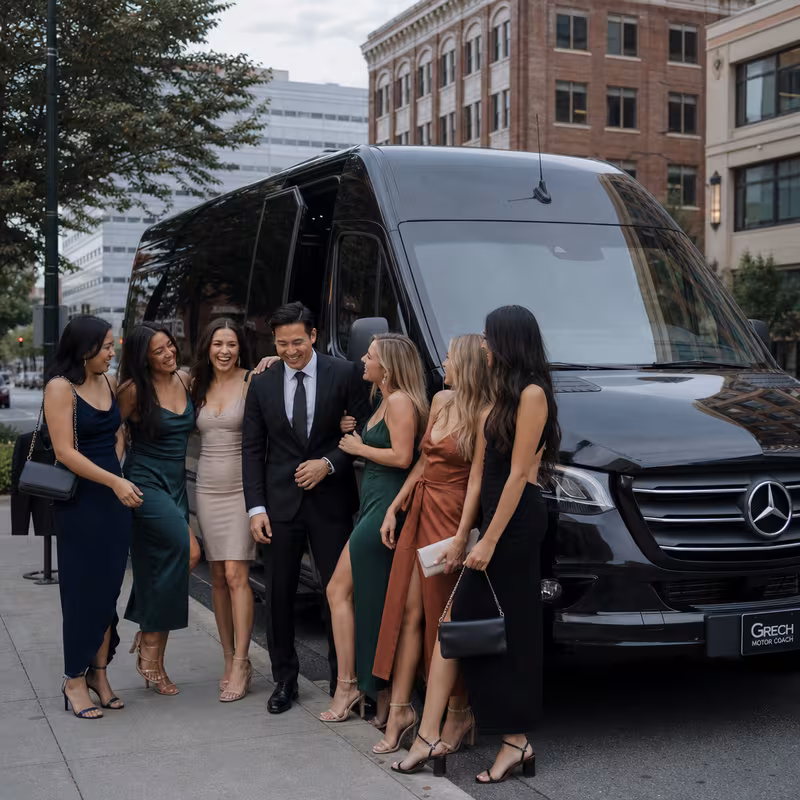 Group boarding a white charter bus for Bachelor & Bachelorette Transportation transportation in Spokane