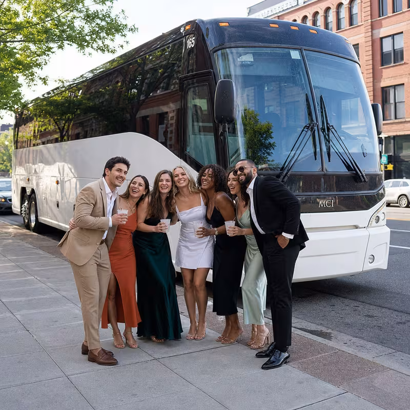 Passengers loading luggage while boarding an Spokane group shuttle