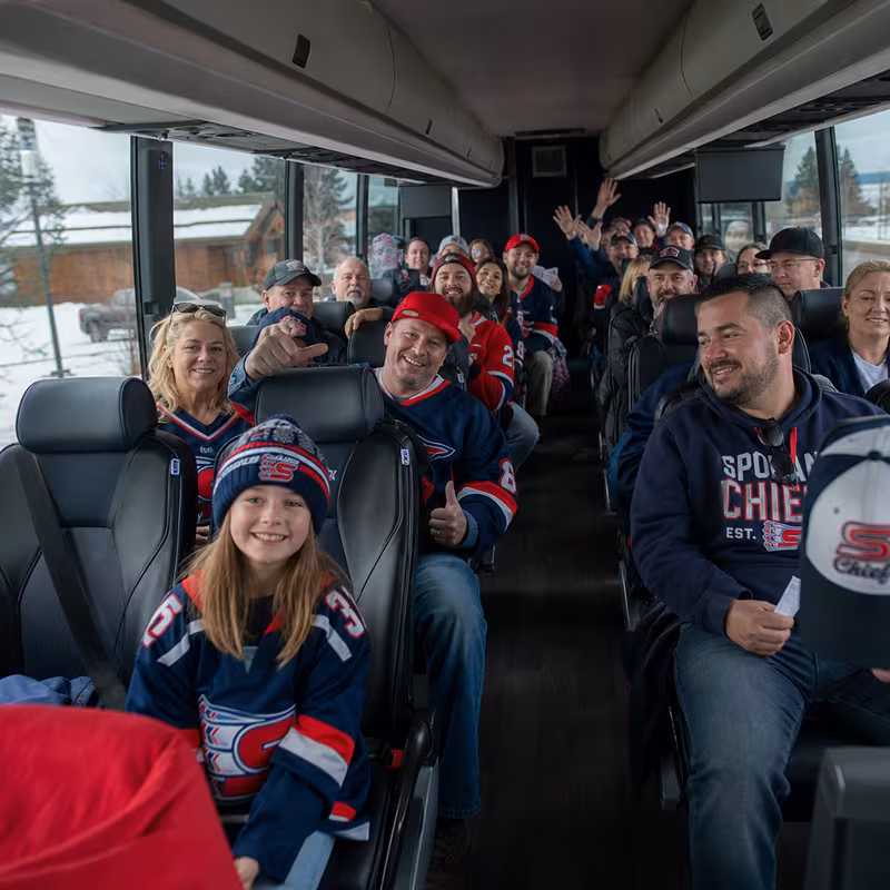 Black Mercedes Sprinter van staged for an Spokane Sporting Event Transportation group