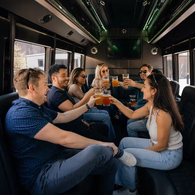Black Mercedes Sprinter van staged for an Spokane Winery & Brewery Tour Transportation group